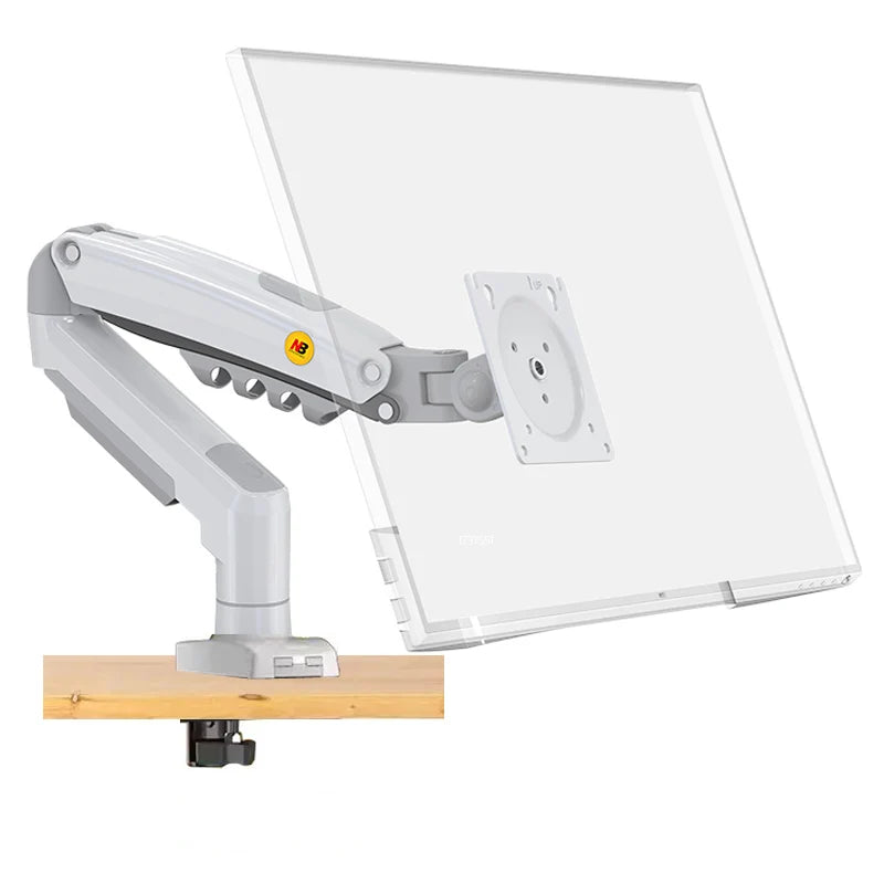 Adjustable ergonomic monitor arm mounted to desk for workspace organization