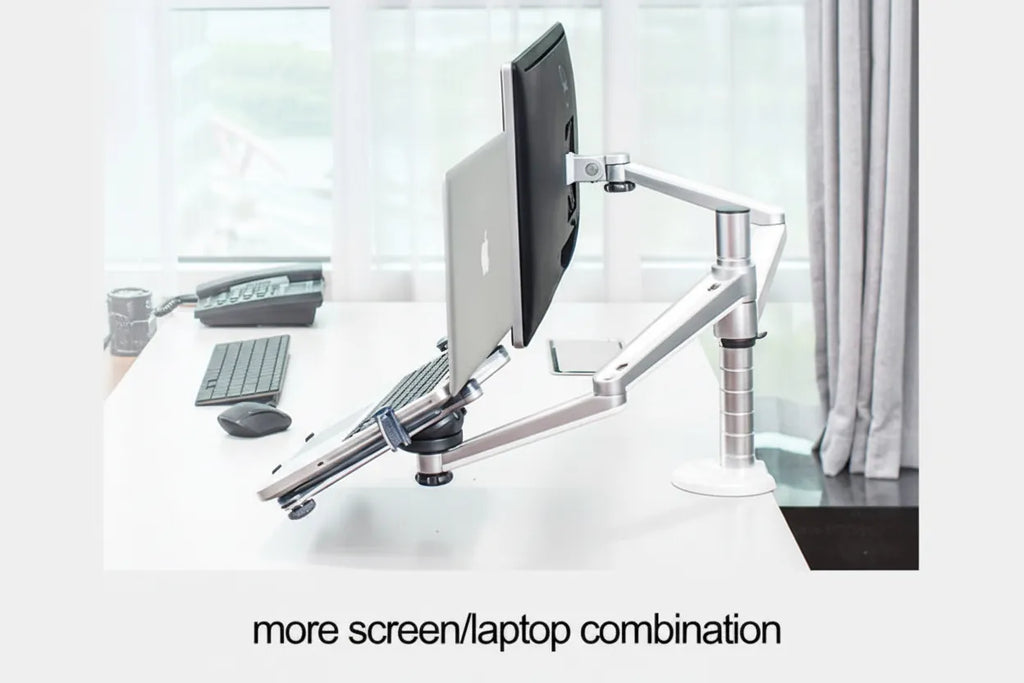 Desk setup with a monitor and keyboard on a white surface, with text 'more screen/laptop combination'.