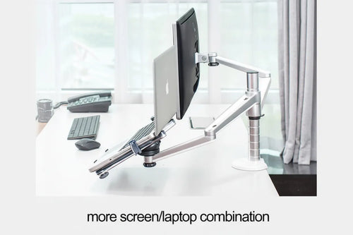 Desk setup with a monitor and keyboard on a white surface, with text 'more screen/laptop combination'.