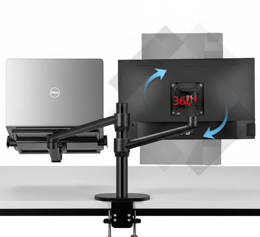 Dual monitor arm holding a laptop and computer monitor on an ergonomic desk setup