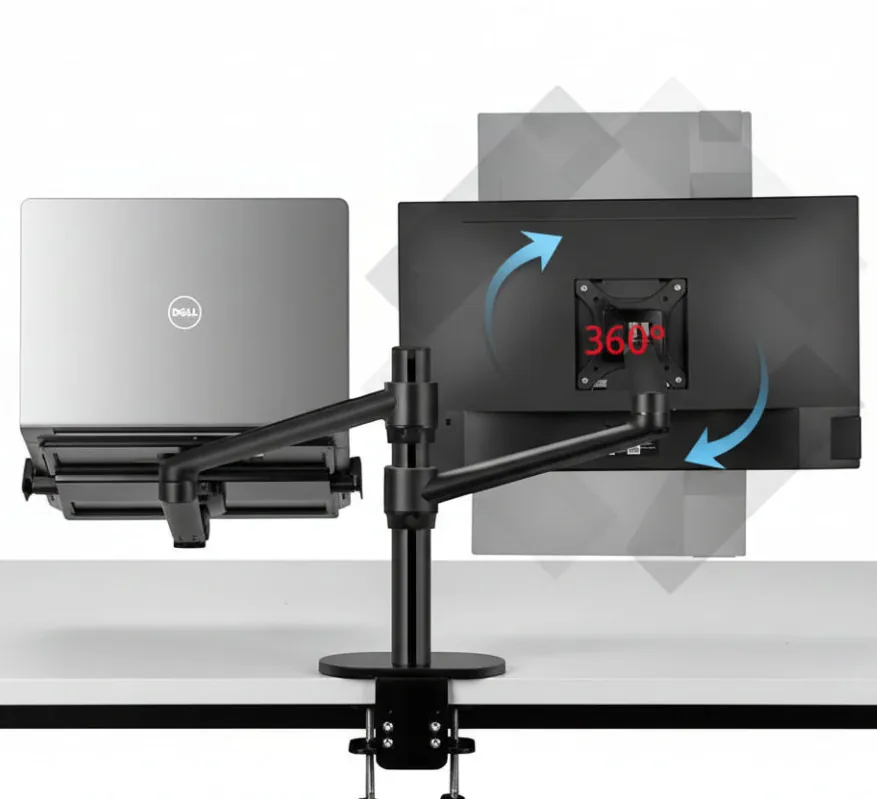 Dual monitor arm holding a laptop and computer monitor on an ergonomic desk setup