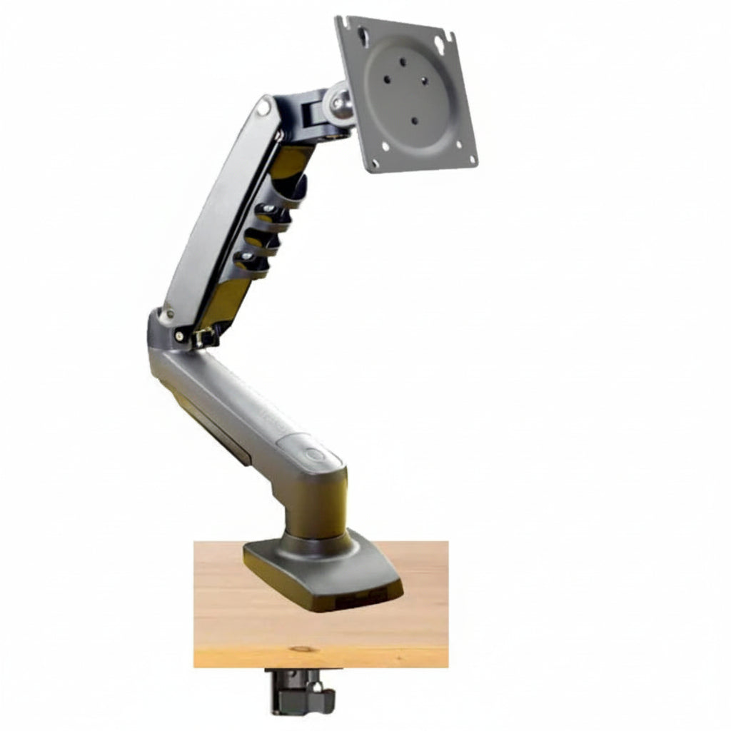 Adjustable monitor arm clamp mounted on wooden desk for ergonomic workspace setup