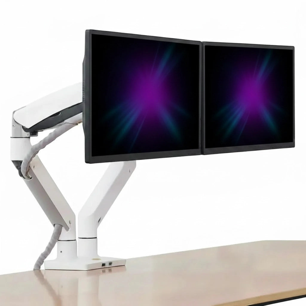 A white dual-monitor desk mount on a light wood desk against a white background. The monitor arms support two black-framed screens displaying a purple and blue abstract wallpaper.